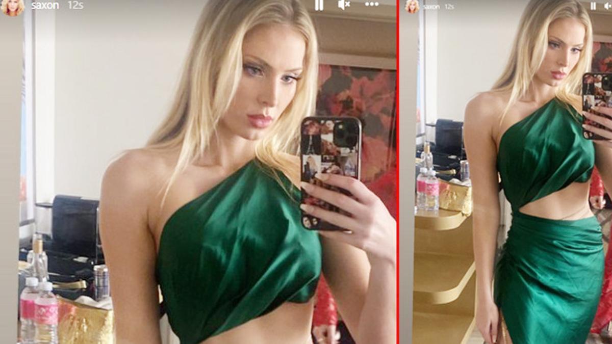 Biri market poşetiyle oburu buruşuk elbiseyle kırmızı halıda