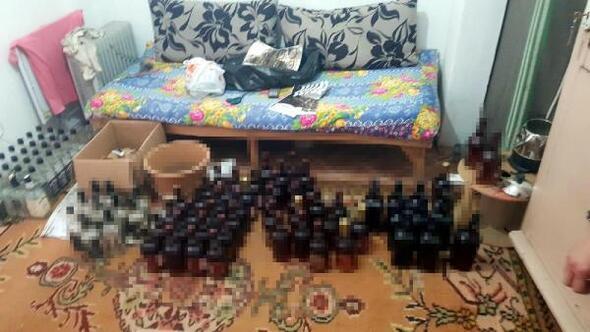 İzmirde sahte içki üretimi yapılan eve baskın: 2 gözaltı