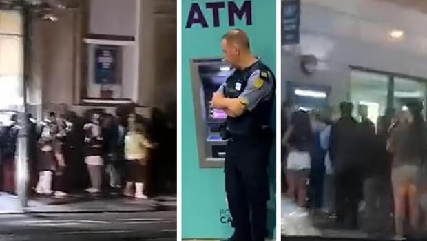 ATM'ler teknik arıza nedeni ile para dağıtmaya başladı! Binlerce kişi kuyruk oldu, olaya polis müdahale etti...