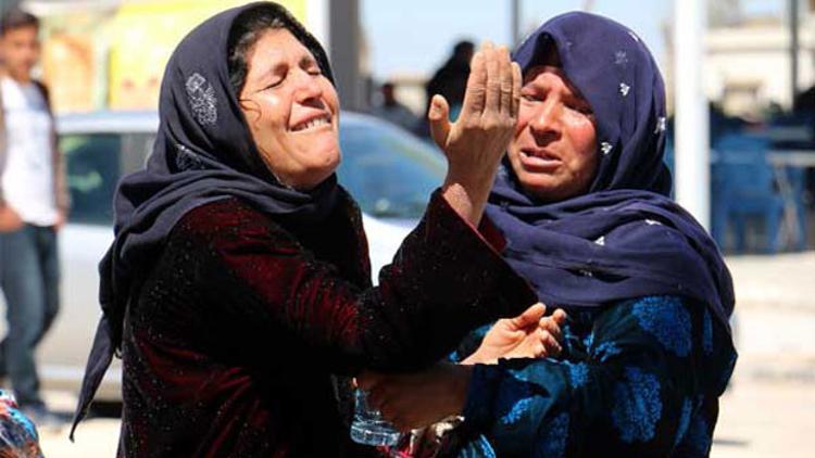 Kanala düşen çocuklarını kurtardı