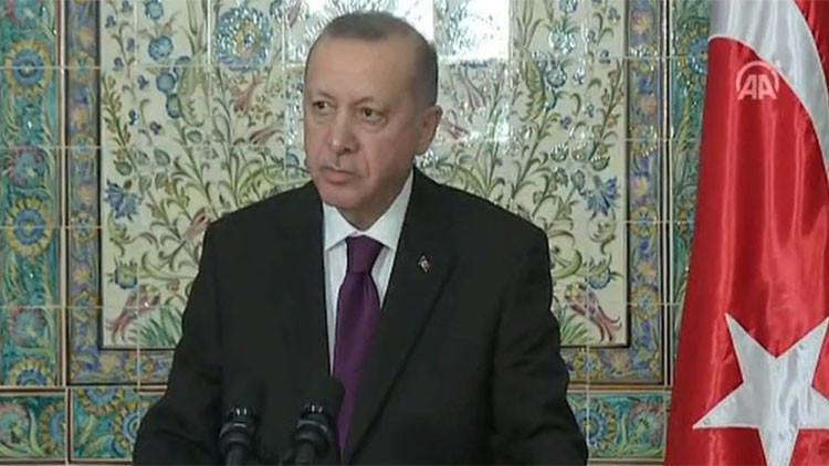 Son dakika... Cumhurbaşkanı Erdoğan'dan Cezayir'de vize açıklaması