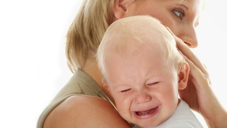 Kucağa alınmak istememek otizm belirtisi olabilir