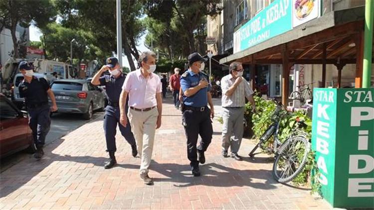Burhaniye’de esnafa maske ve sosyal mesafe uyarısı
