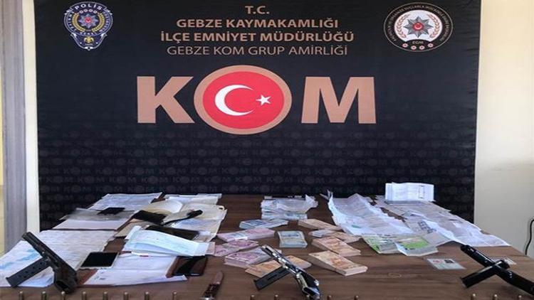 Tefeci operasyonunda 100 bin lira, silah ve borçlu ajandaları ele geçirildi