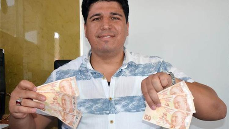 ATM’den çektiği paralar arasında, 6 adet hatalı basım 50 TL çıktı