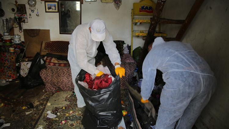 Evinden 2 kamyonet çöp çıkan yaşlı kadının koronavirüs testi pozitif çıktı