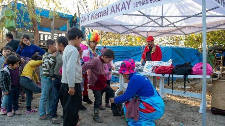 Seyhandan mevsimlik tarım işçisilerine giyim ve soba desteği