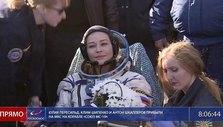 The Russian team that shot the first movie in space returns to Earth