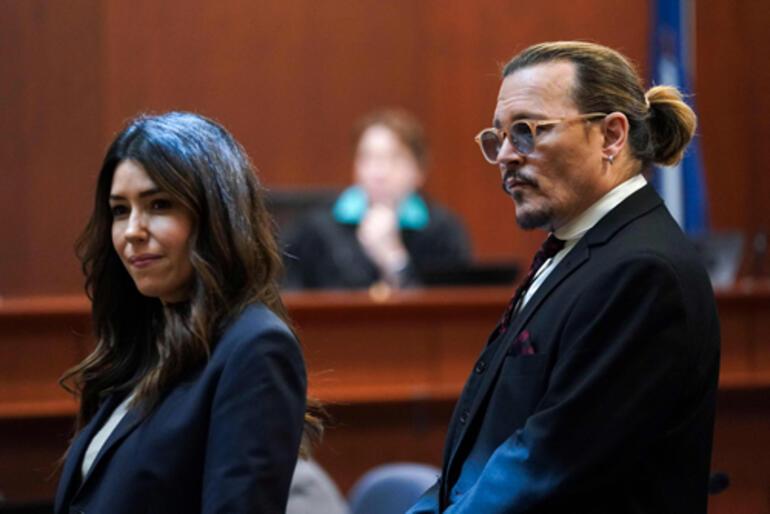 Is Johnny Depp flirting with his lawyer?