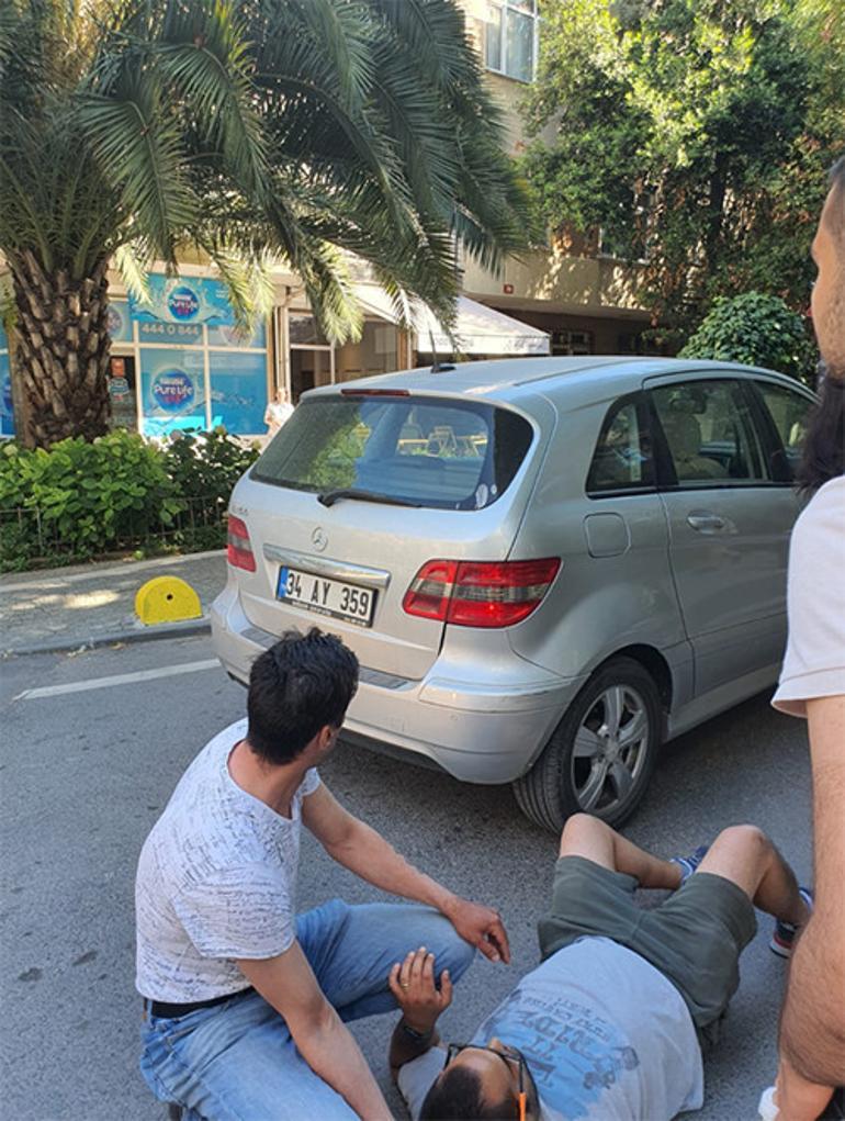 TV director Alican Güven escaped at the last minute while under the car with his son