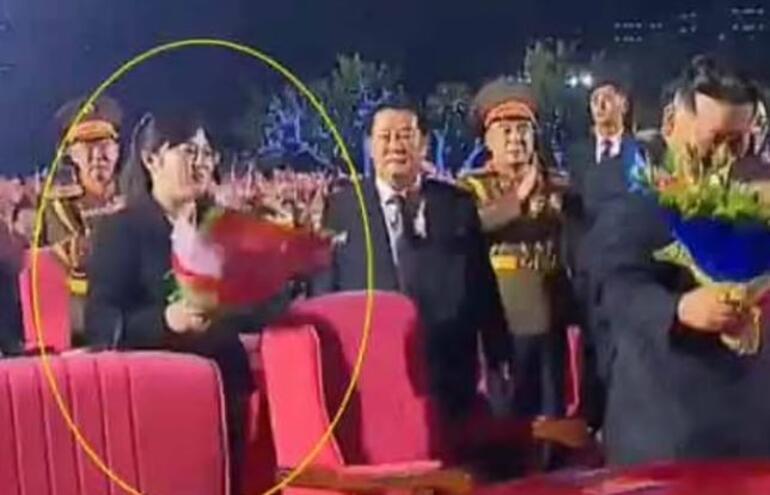 Who is the mysterious woman next to Kim Jong-un, who claims to be talked about more than the USA?