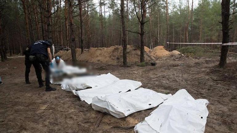 Zelenski: More than 400 bodies found in mass grave in Izyum