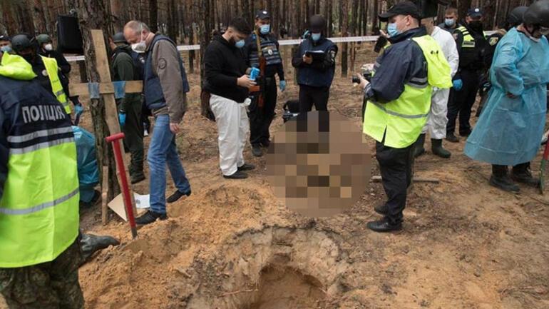 Zelenski: More than 400 bodies found in mass grave in Izyum