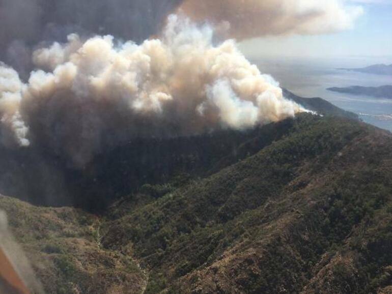 Marmaris'te Yalancıboğaz mevkiinde orman yangını Rüzgar etkili, müdahale yapılıyor