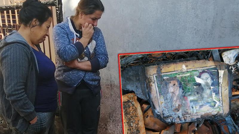 Yanan evinin enkazında sağlam kalan eşya aradı