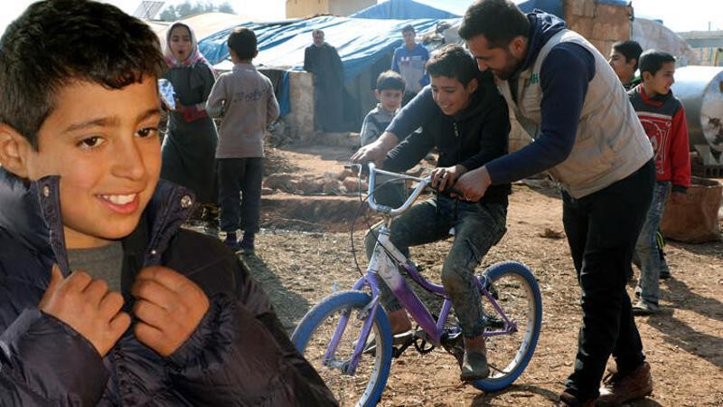 'Babamdan sonra ceket alan olmadı' diyen Suriyeli Fuad'a mont ve bisiklet hediyesi