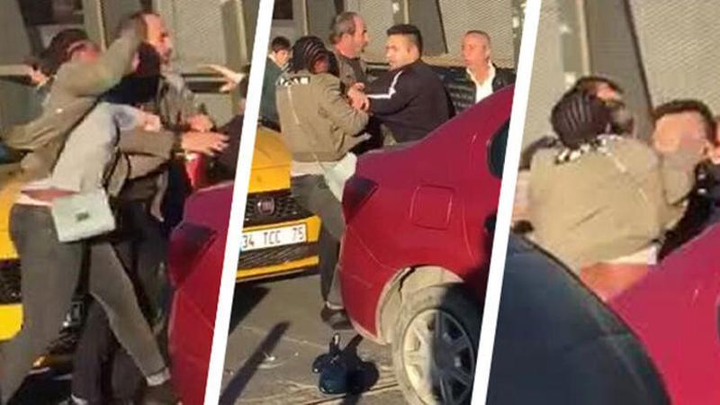 Kadın yolcudan taksiciye “şarj aleti” dayağı