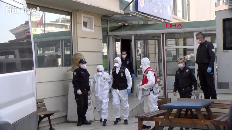 Adliyeye sevk edilen şüpheliye tulum ve koruyucu maskeli önlem