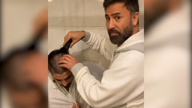 İzzet Yıldızhan, büyük oğlu Mustafa Yıldızhan’ı traş etti.
