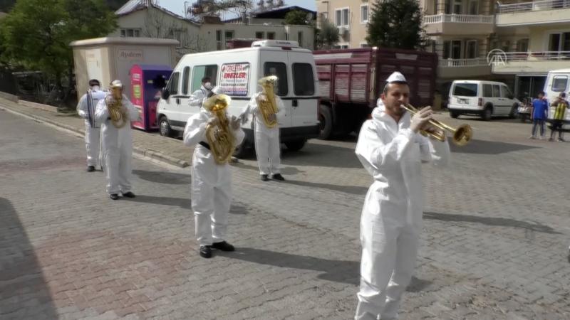 Marching bands perform on streets to boost locals’ morale