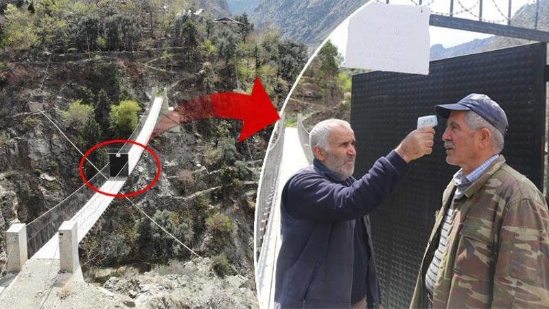 Güvenlik için yaptıkları demir kapıyı korona için kullanıyorlar
