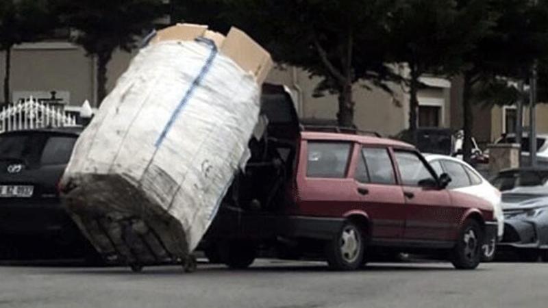 Yokuşu çıkamayan kağıt toplayıcısına otomobili ile böyle yardım etti