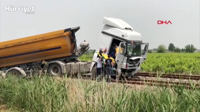 Yoldan çıkan hafriyat kamyonu tren raylarında durabildi