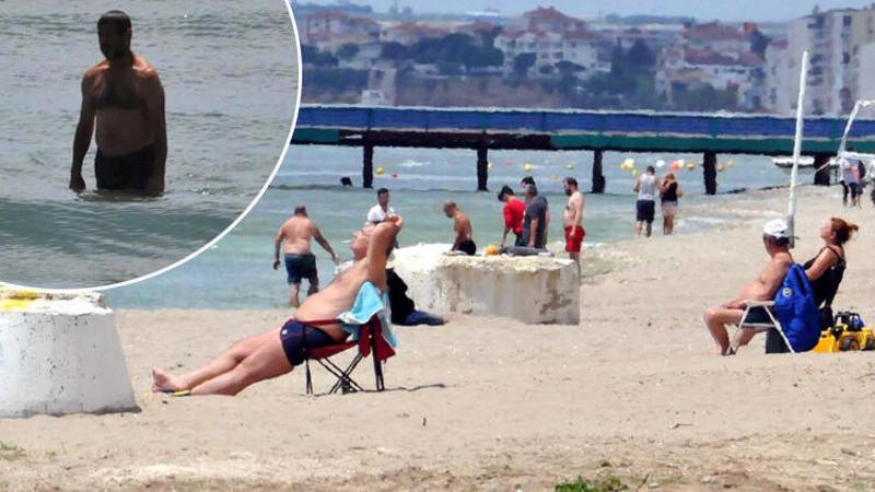 Kumburgaz'da vatandaşlar yasağa rağmen denize girdi