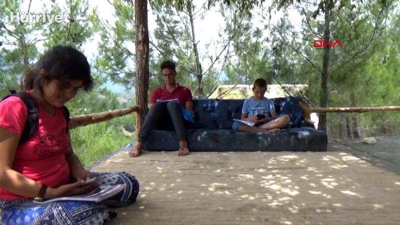 Children trek 4 km in Taurus Mountains every day to pick up signal for online classes