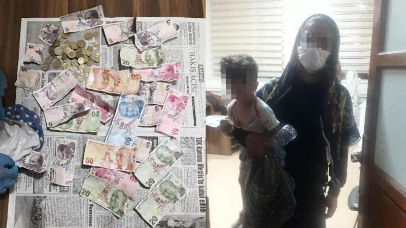 Dilencinin, topladığı paraları torununun üzerinde sakladığı ortaya çıktı