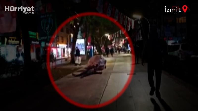 Kağıt toplayıcısının kendini yere atarak para istemesi kameralara yansıdı
