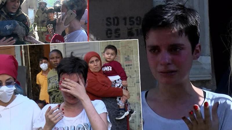 Kedisi yangında mahsur kalan genç kız gözyaşlarına boğuldu