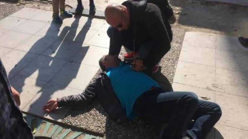 Bir anda yere yığılan kişi, koronavirüs paniğine neden oldu