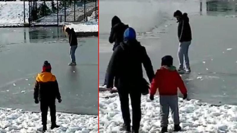 Vatandaşlar buz tutan Nilüfer Çayı'nın üzerinde yürüdü