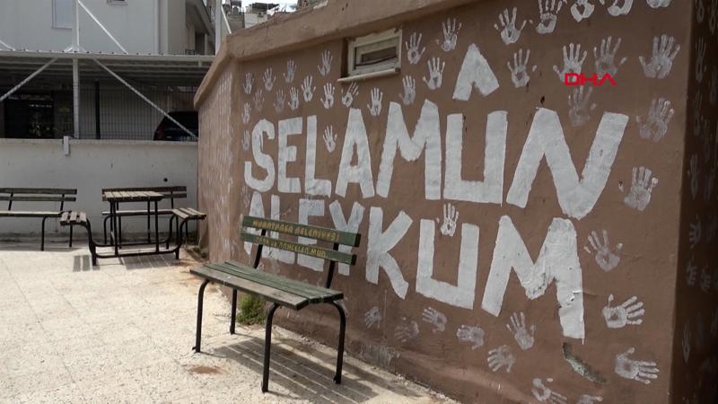 Caminin bahçe duvarını avuç içiyle boyadı, gözaltına alındı
