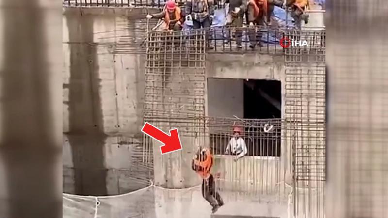 İnşaat işçisi metrelerce yüksekten yere çakılmaktan son anda kurtuldu