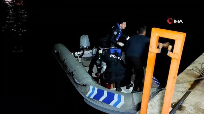 Kıyafetleriyle denize giren kadının çığlıklarına deniz polisi yetişti