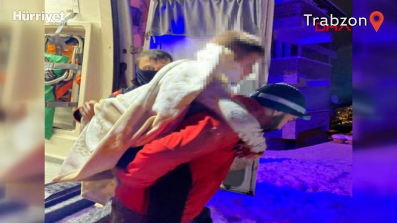 Hasta çocuğu karlı yolda sırtında taşıyan hemşireye ödül