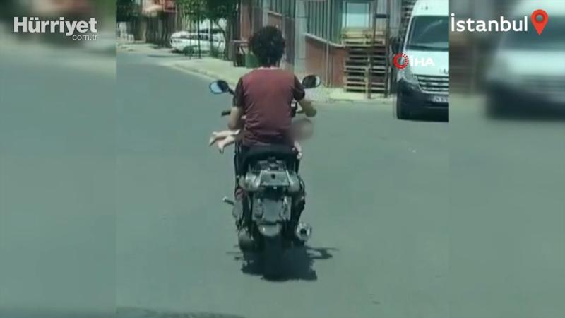 Sultanbeyli’de şoke eden görüntü: Motosiklet sürerken kucağında bebek taşıdı