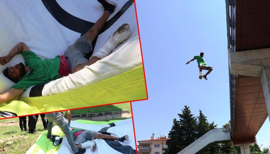 Üst geçitten atladı, polisten özür diledi Üst geçitten atladı, polisten özür diledi